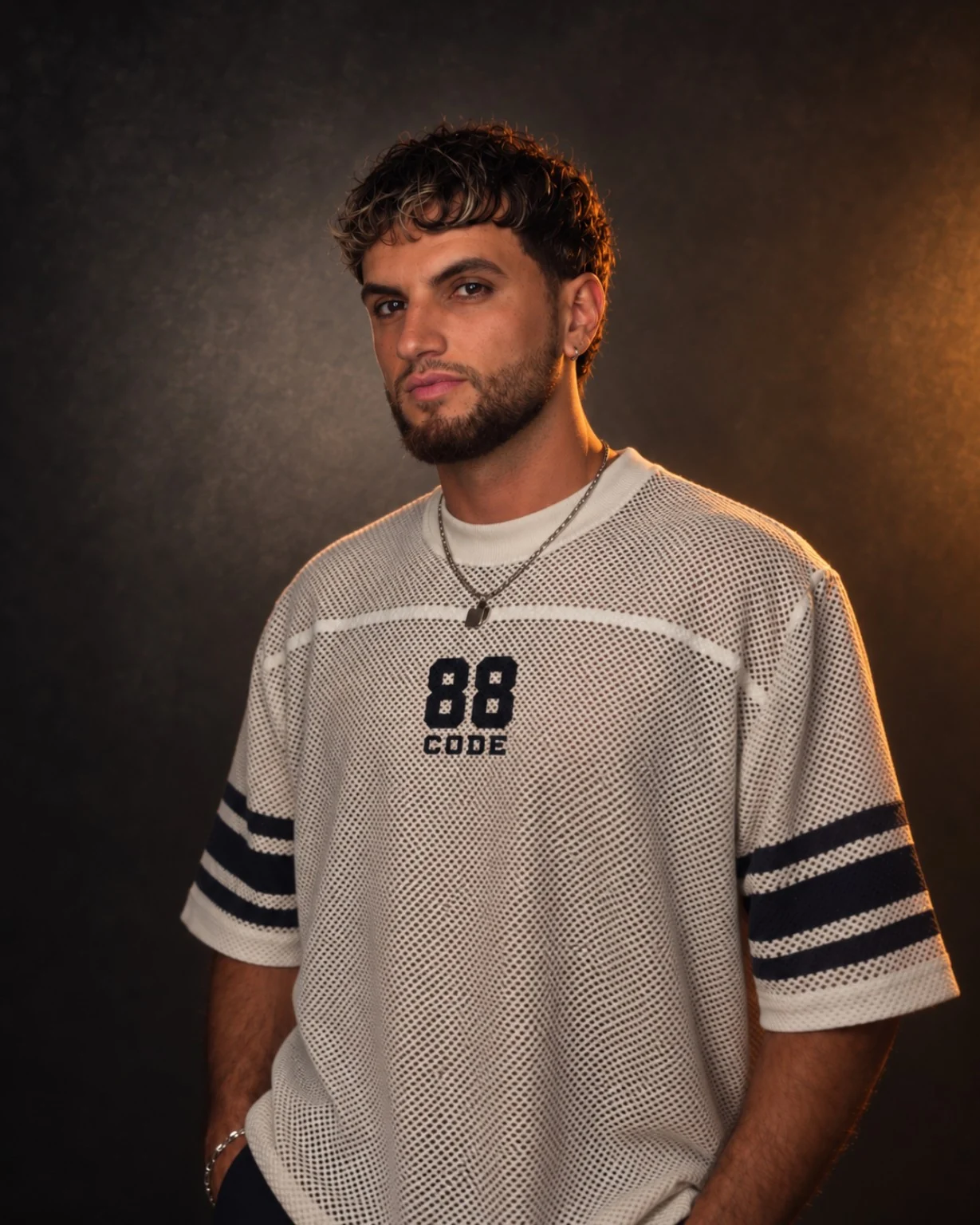 FADISM in a white CODE88 jersey